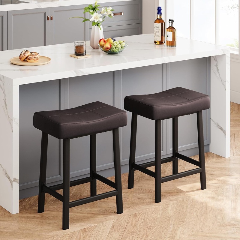 24 Inch Backless Saddle Barstools Set of 2, Counter Height Upholstered Padded Barstools with Curved Surface, Metal Leg and Footrest, for Kitchen Counter, Home Bar (Brown, 24 Inch-Set of 2) Brown 1